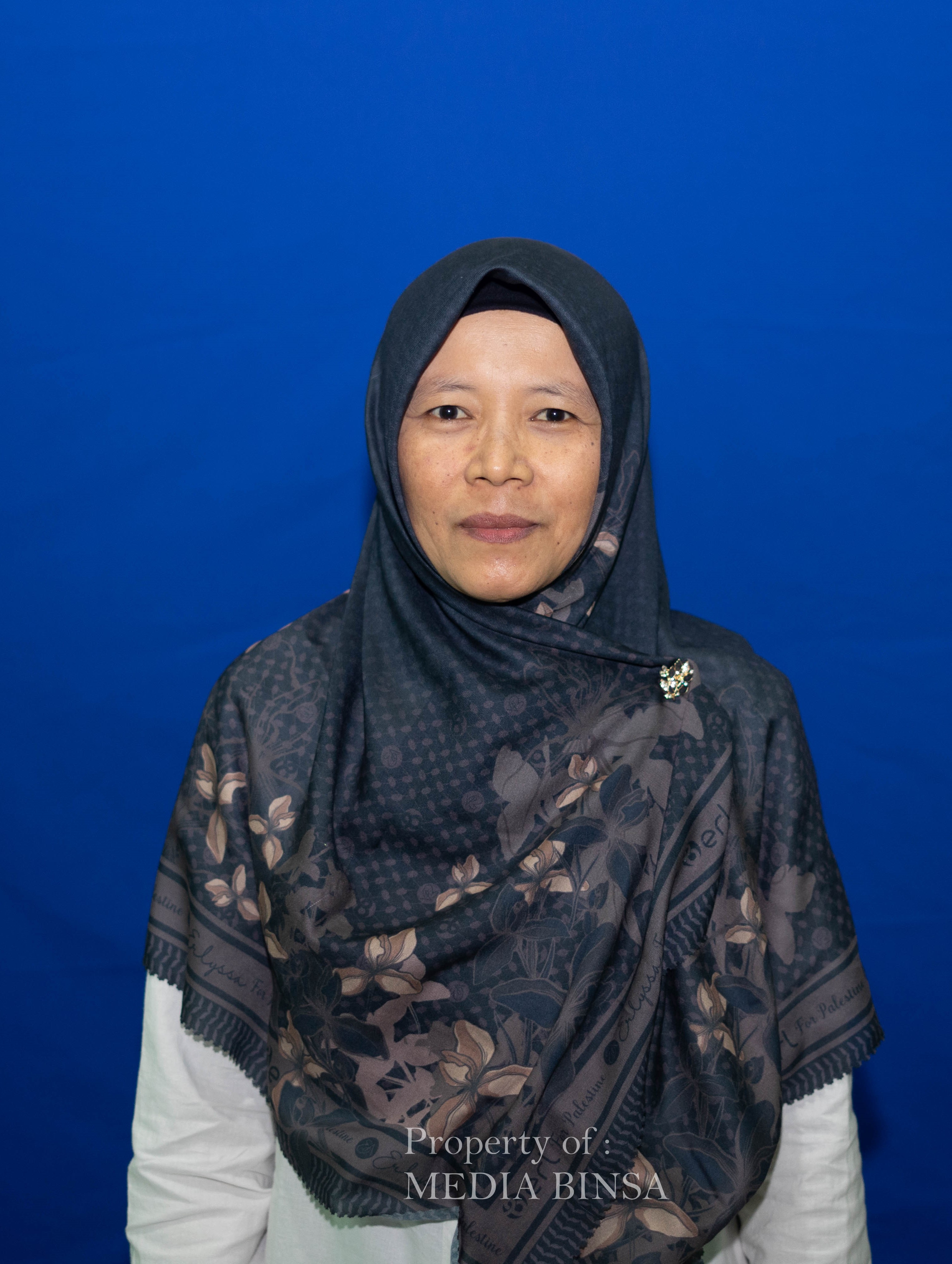 Hj. Siti Taqwimah, M.Pd